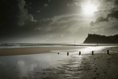 A stormy view of the Ness and the mouth of the River Teign, seen from the Teignmouth seafront, Devon, Great Britain.